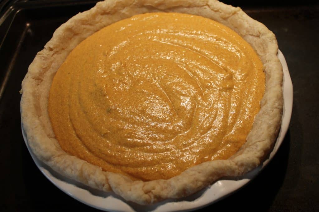 the pumpkin pie filling added to a pre-baked pie shell. 