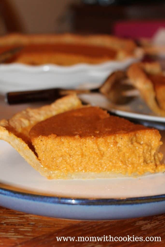 Pumpkin Pie Without Canned Milk - www.momwithcookies.com #pumpkinpie #recipe #pumpkinpierecipe #pumpkinpiewithoutcannedmilk #pumpkinpiewithsourcream #pumpkinpiewithoutevaporatedmilk #pumpkinpiewithoutcondensedmilk #pumpkinspice #pumpkinspicerecipes #pumpkinspicefood #pumpkinrecipe #pumpkinrecipes