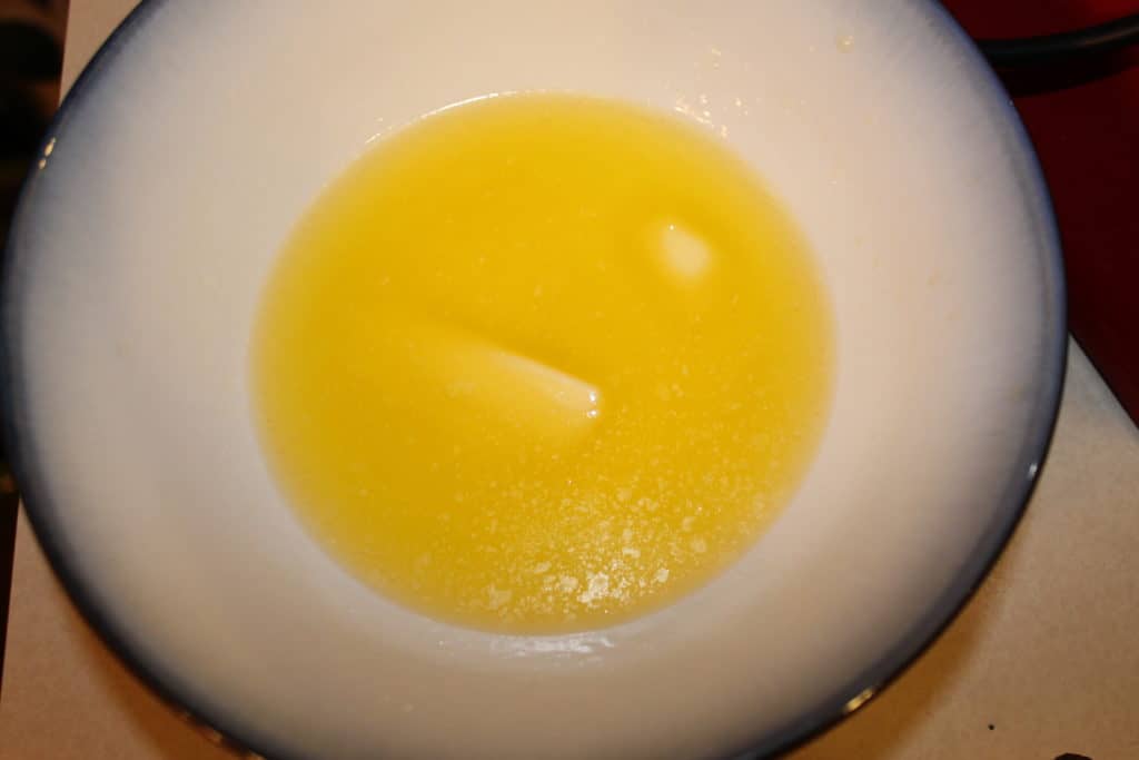 Melted butter in a bowl.