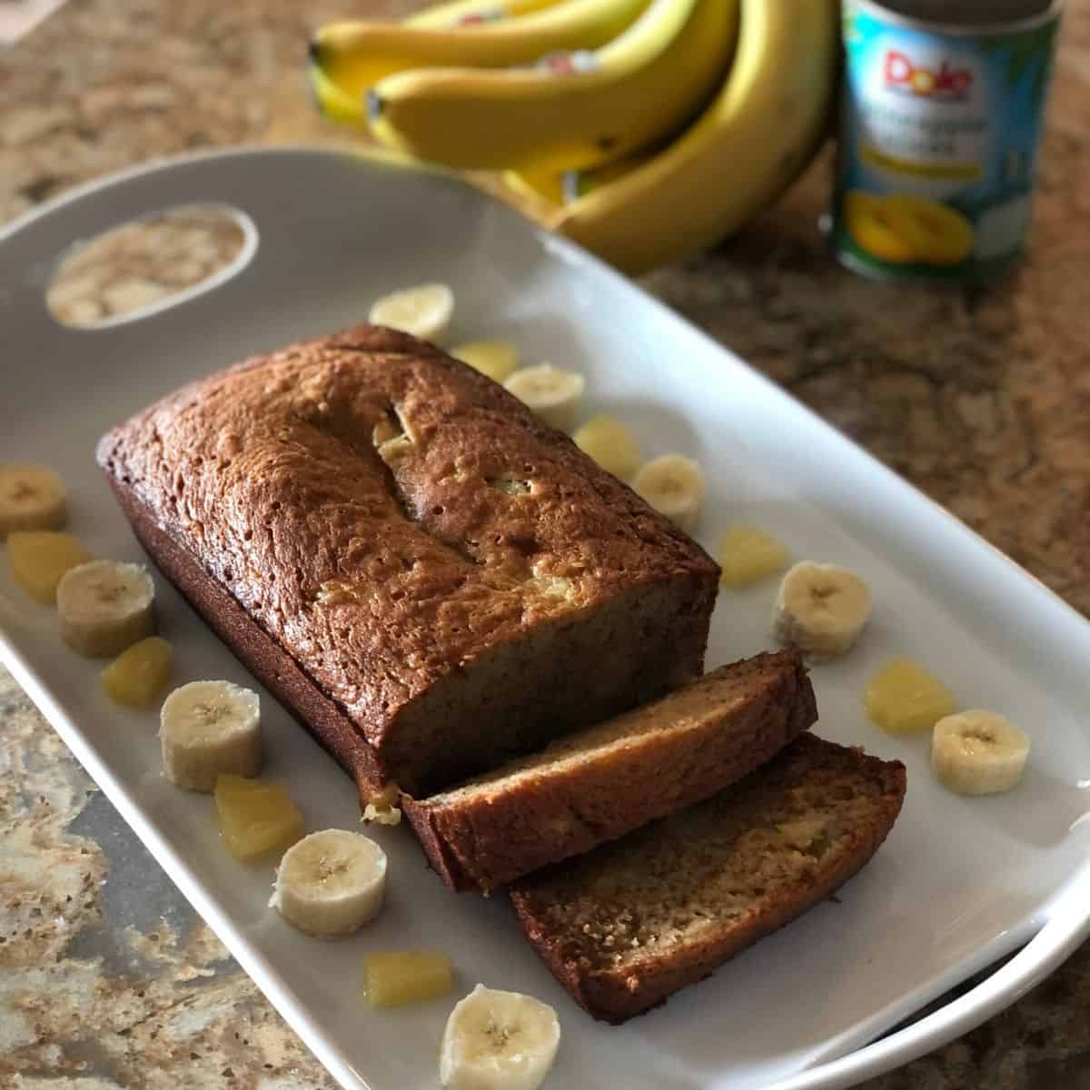 sliced pineapple banana bread on a breakfast tray