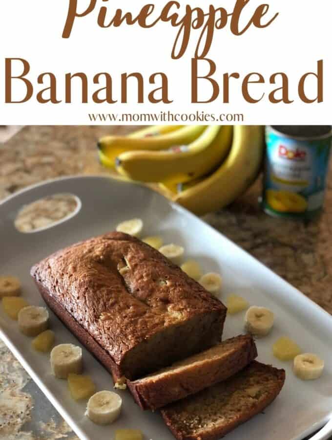pineapple banana bread on a serving tray with little slices of banana