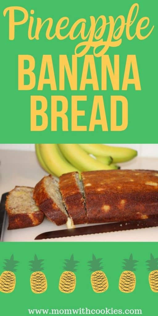 Pineapple banana bread sliced on a cutting board.