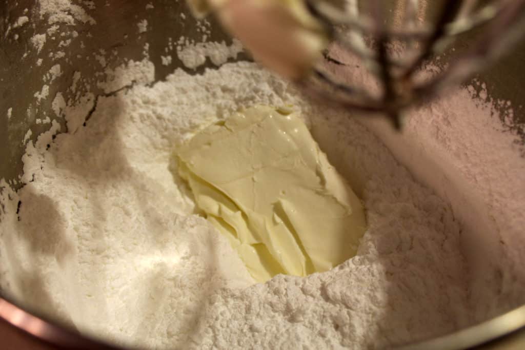 Cream cheese and vanilla extract added to the powdered sugar.