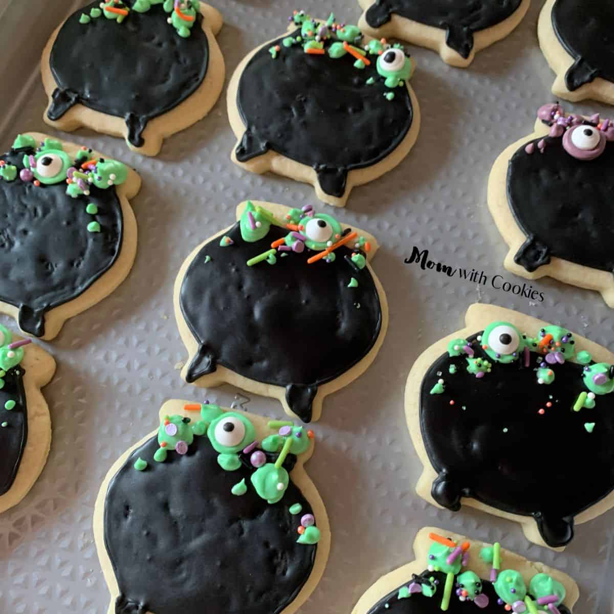 homemade sugar cookies decorated to look like witch cauldrons