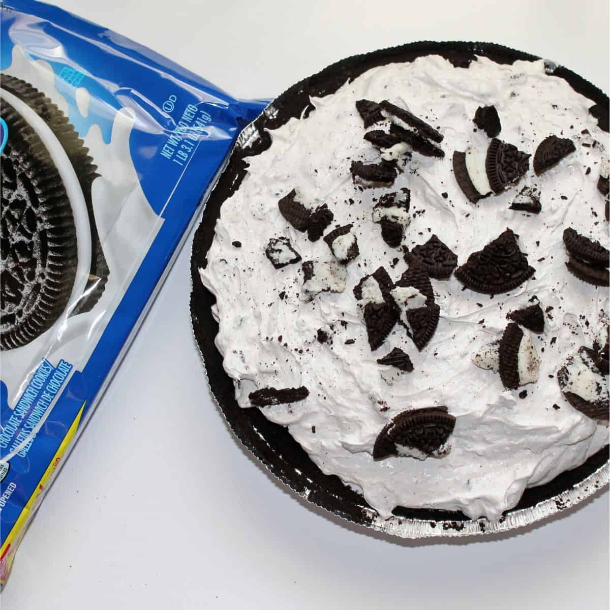 oreo cream pie with chopped oreo cookies on top