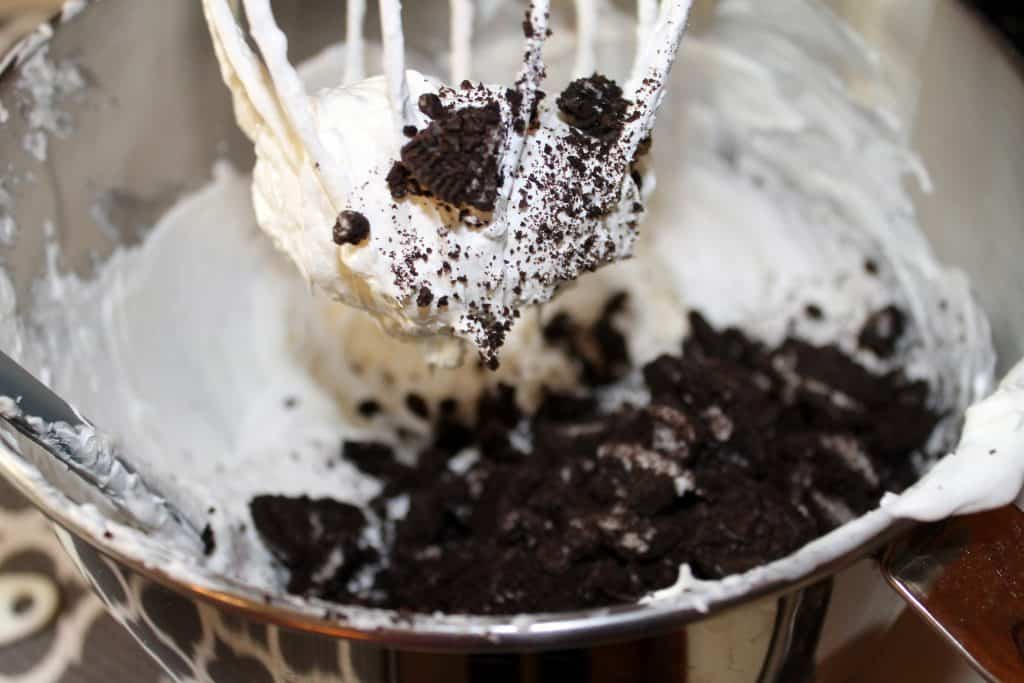 Crushed oreo cookies added to the cool whip cream mixture.