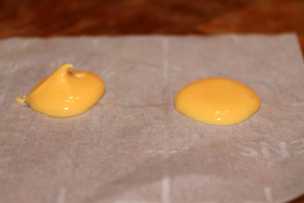 royal icing comparison of piping consistency and flooding consistency the piping consistency holds its shape and the flooding consistency doesn't