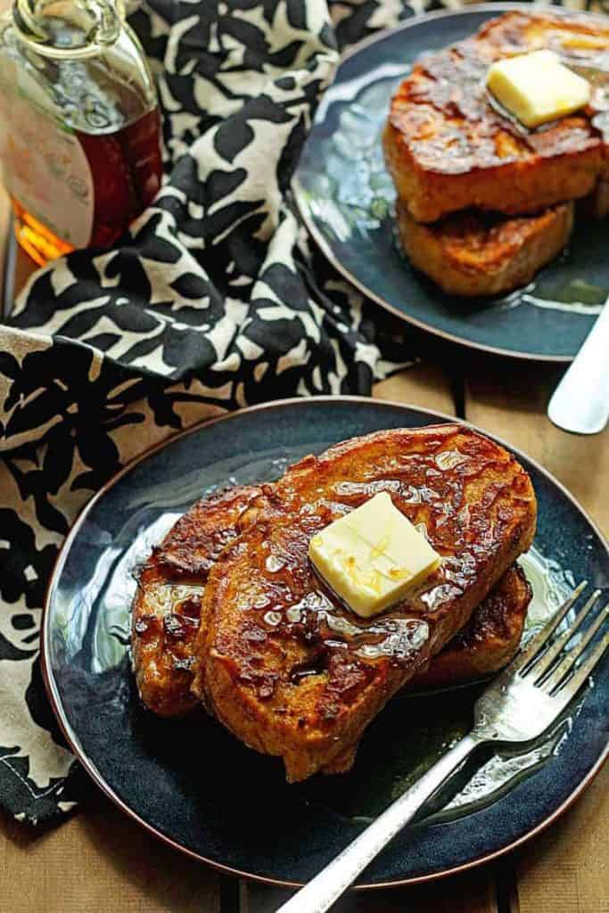 pumpkin french toast with syrup and butter on top