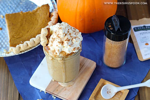 a jar filled with pumpkin pie milkshake