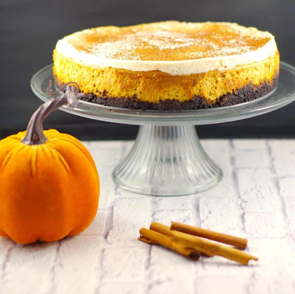 a pumpkin cheesecake with oreo crust