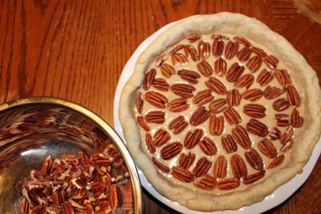 The Best Pecan Pie Recipe - www.momwithcookies.com #pecanpie #pecanpierecipe #southernpecanpie #pecanpiedarkcornsyrup #pecanpiebrownsugar #pecanpiebutter #pecanpiethanksgiving #easypecanpie #recipeswithpecans #bestpecanpie #homemadepecanpie