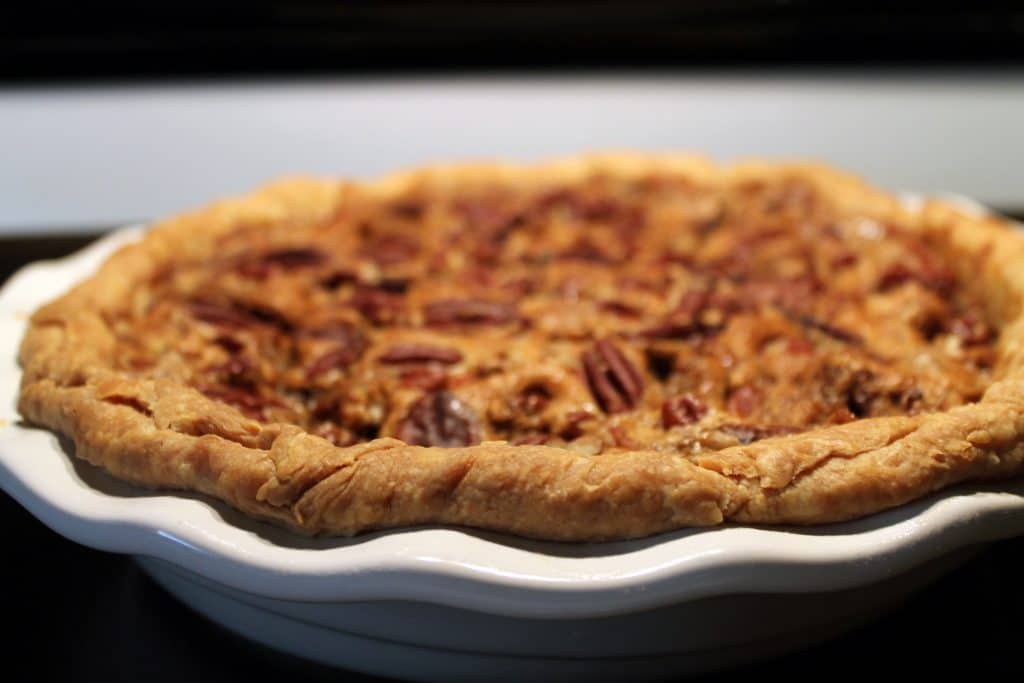 The Best Pecan Pie Recipe - www.momwithcookies.com #pecanpie #pecanpierecipe #southernpecanpie #pecanpiedarkcornsyrup #pecanpiebrownsugar #pecanpiebutter #pecanpiethanksgiving #easypecanpie #recipeswithpecans #bestpecanpie #homemadepecanpie