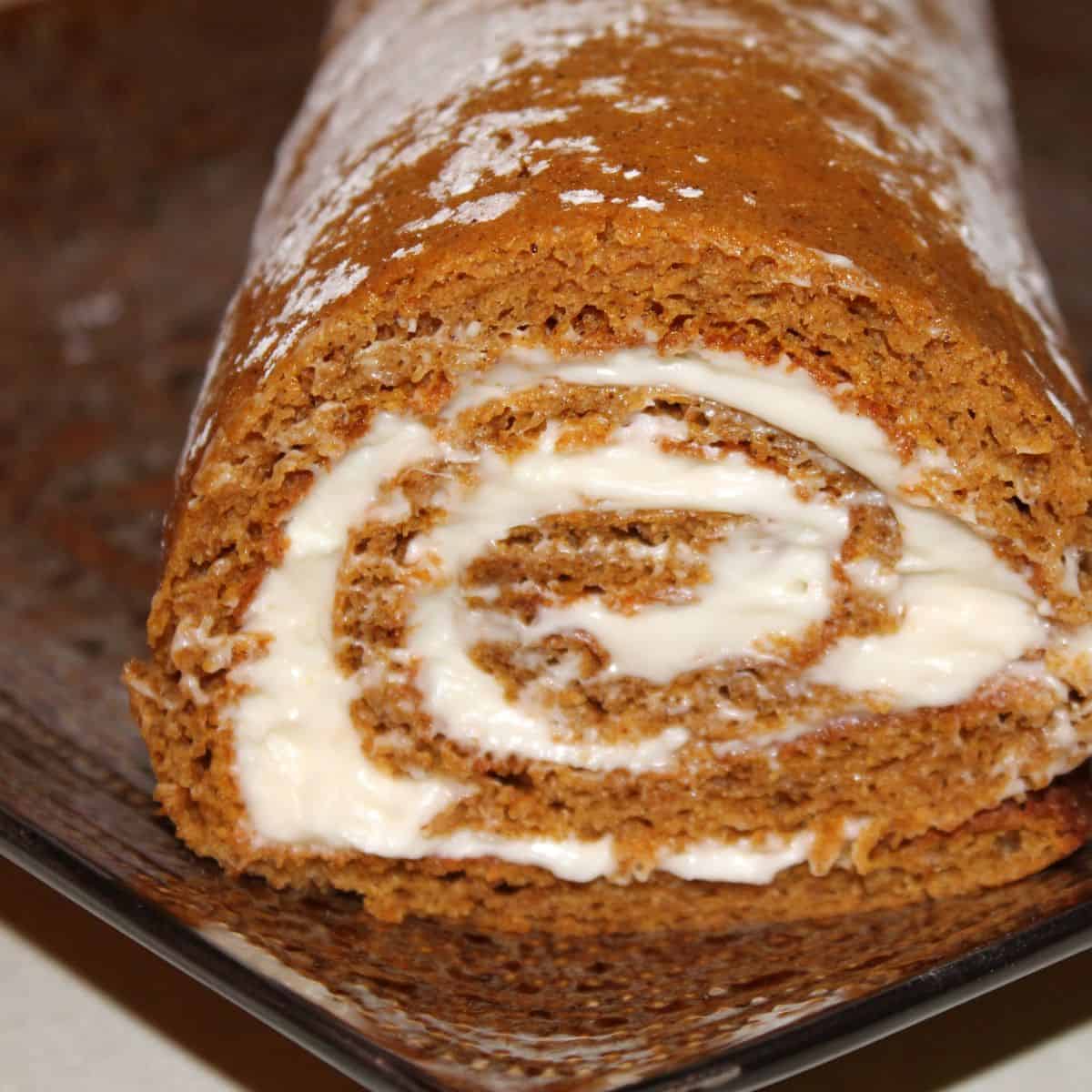 homemade pumpkin log roll with cream cheese filling