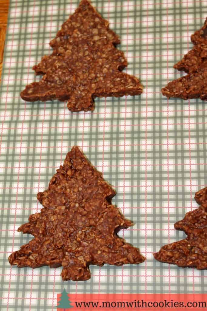 Tree shaped cookies on a plaid background