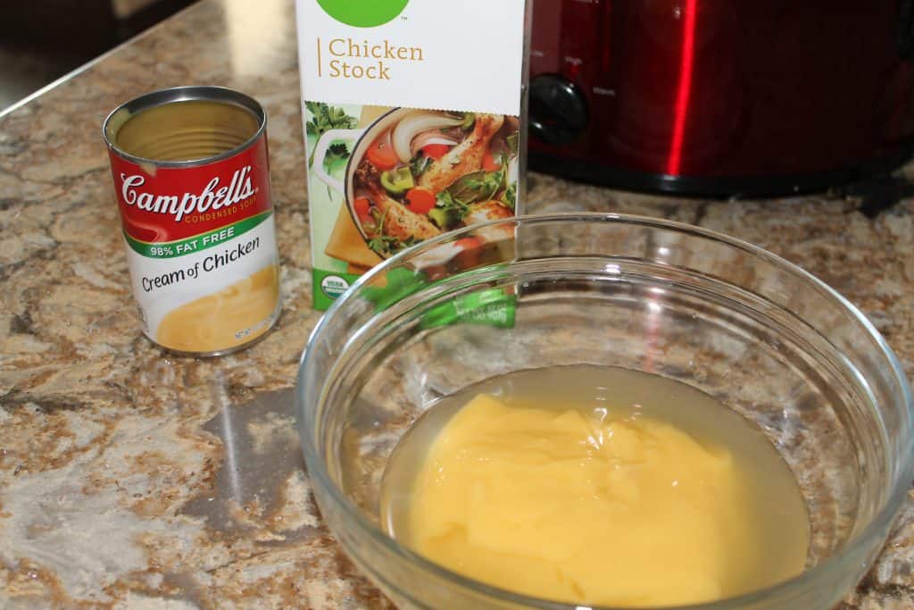 Mixing cream of chicken and chicken stock together