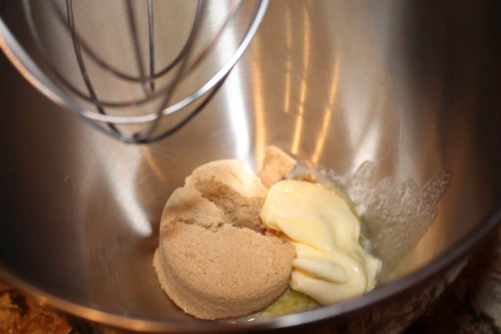 a bowl with brown sugar and butter in it