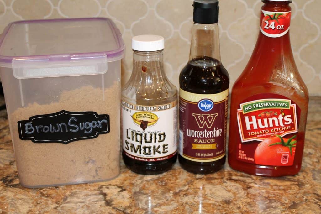 ingredients for homemade barbecue sauce showing brown sugar liquid smoke Worcestershire sauce and ketchup