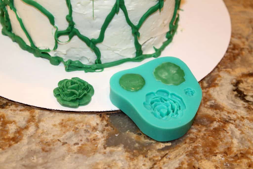 The candy mold for making little edible flowers.