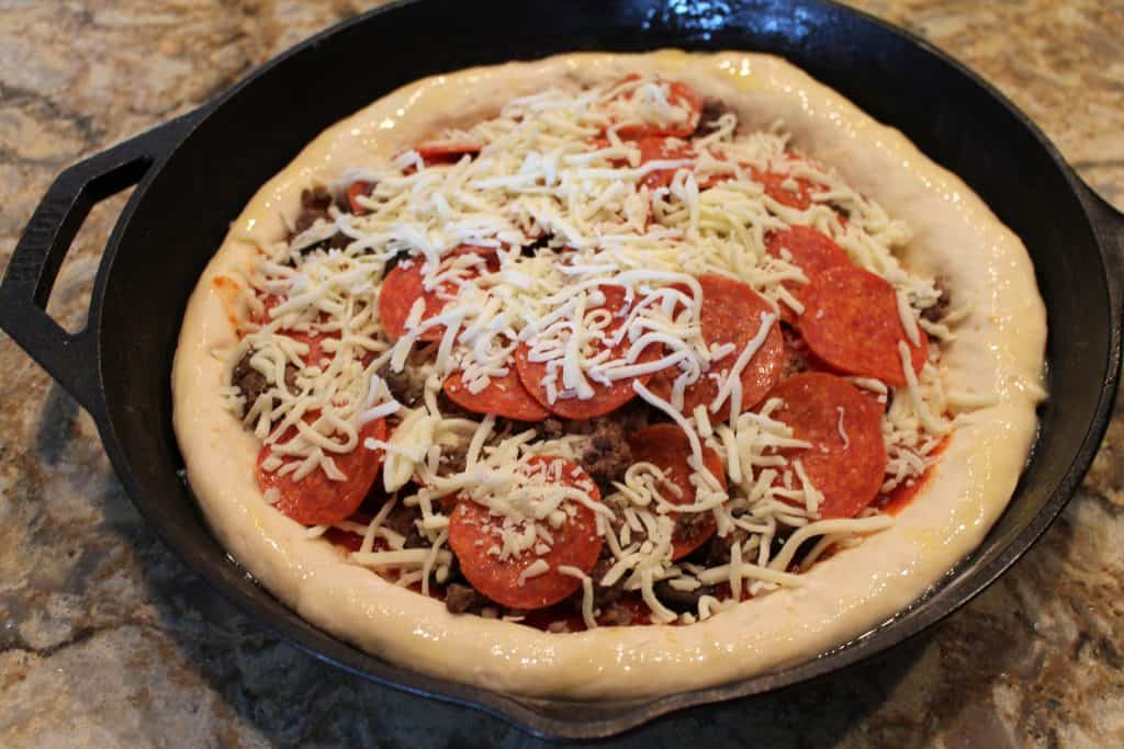 fully assembled pizza ready to bake