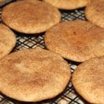 snickerdoodle cookies cooling on a rack