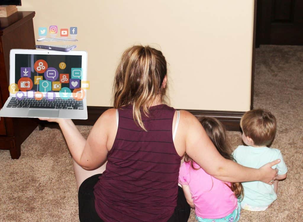 a mom balancing family time with her kids and technology