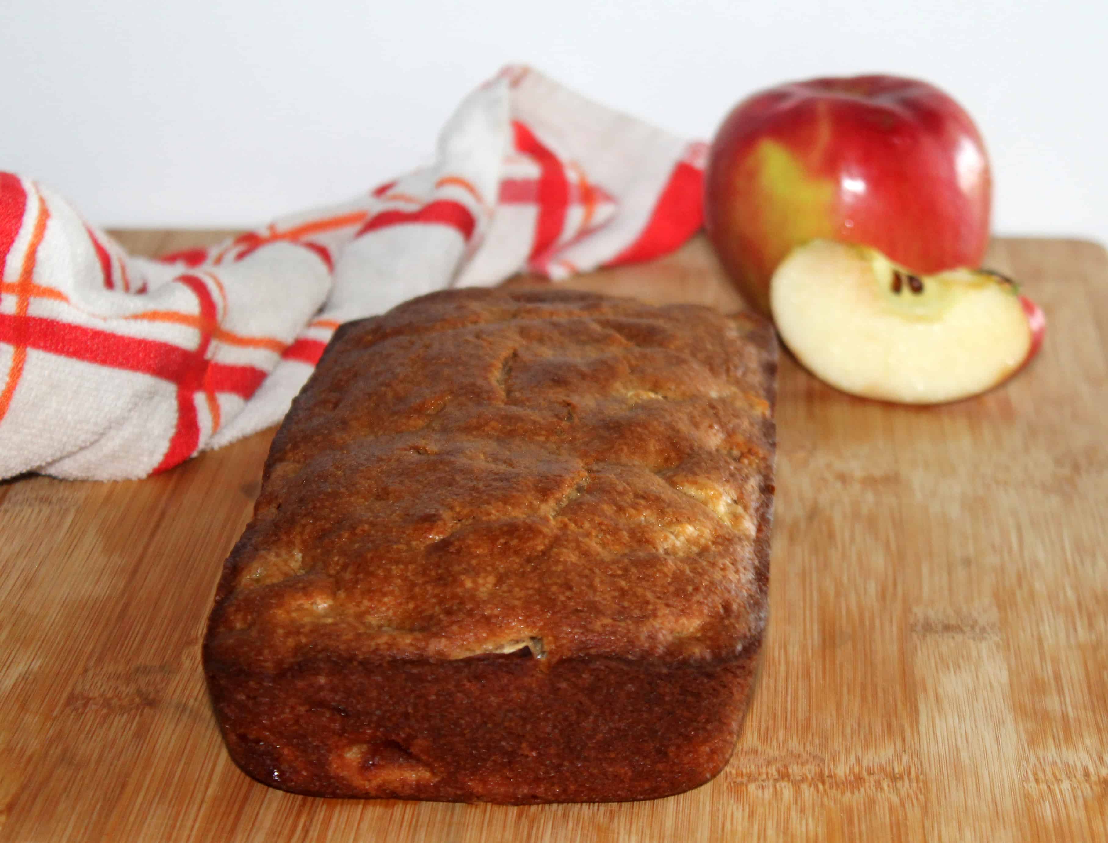 finished apple bread on a wodden cutting board