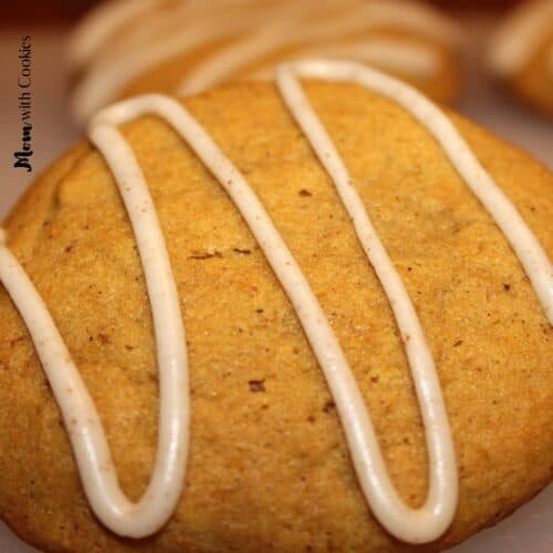 close up image of homemade pumpkin cookies with brown butter icing