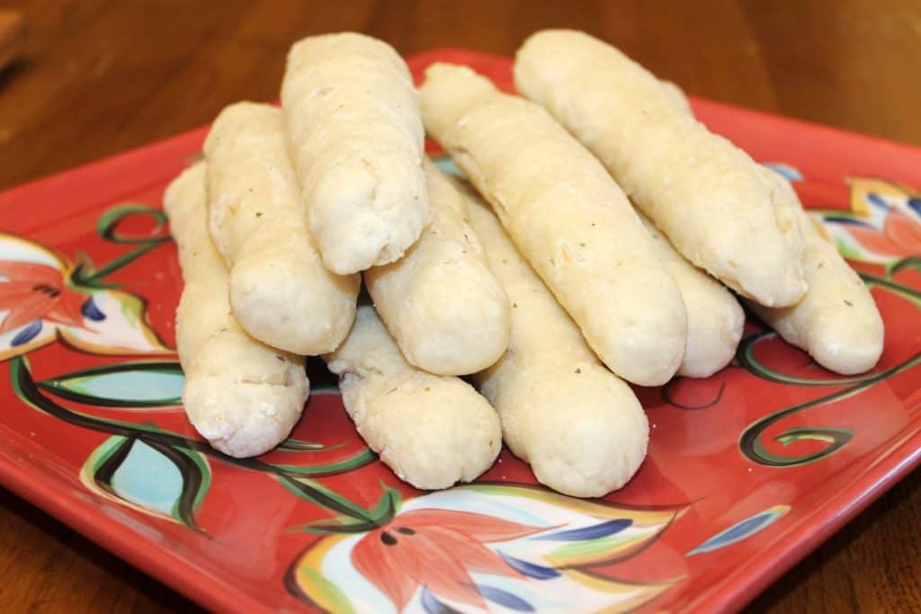 plate full of homemade garlic breadsticks