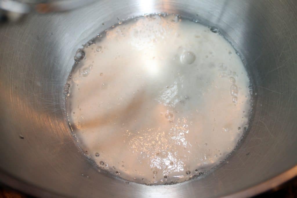 a bowl with yeast that has been activated