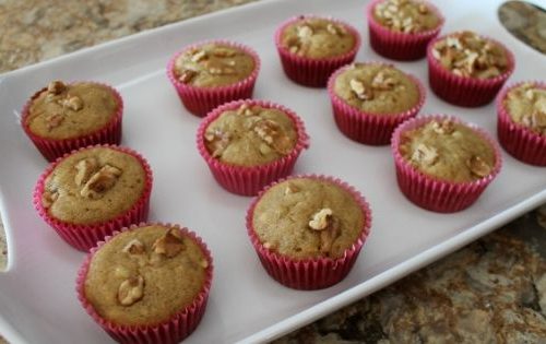 a breakfast tray carrying freshly baked banana nut muffins