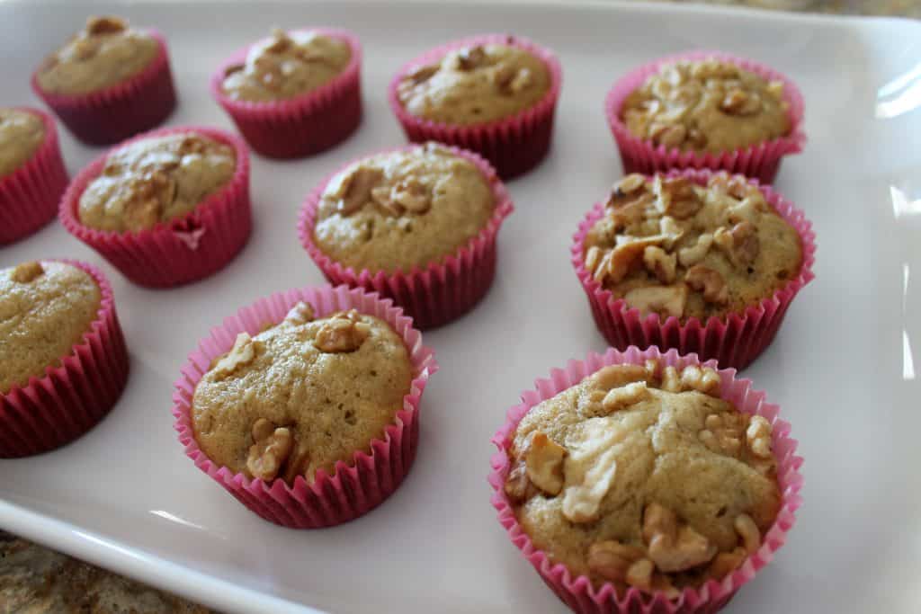 a serving tray with homemade banana nut muffins