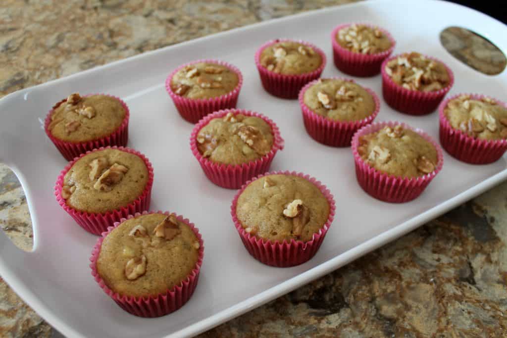 a breakfast tray carrying freshly baked banana nut muffins