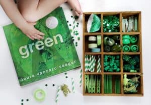 green tinker tray with green objects