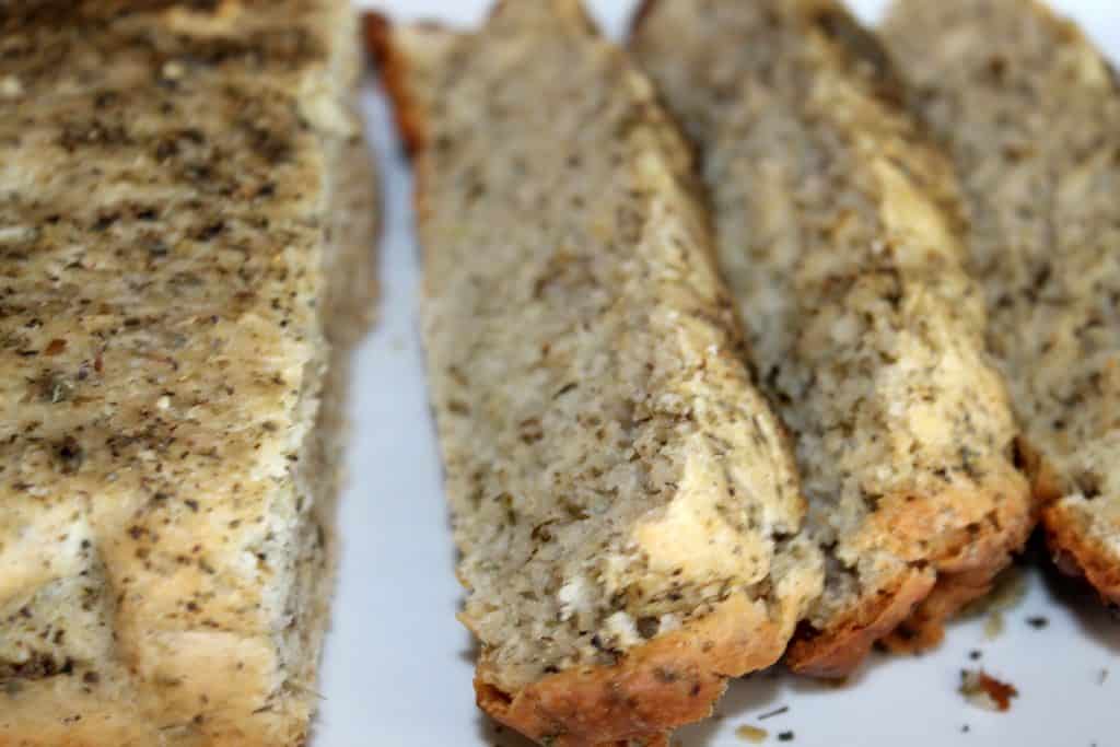 homemade focaccia bread that has been sliced