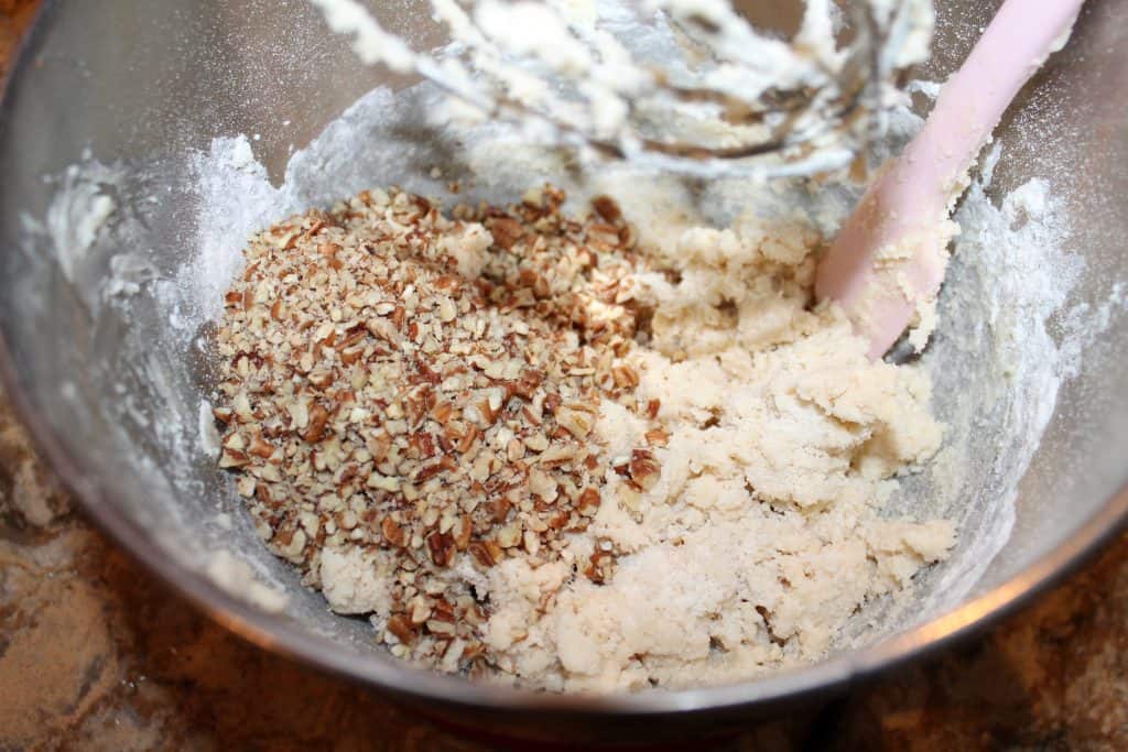 chopped pecan pieces added to mexican wedding cookie dough