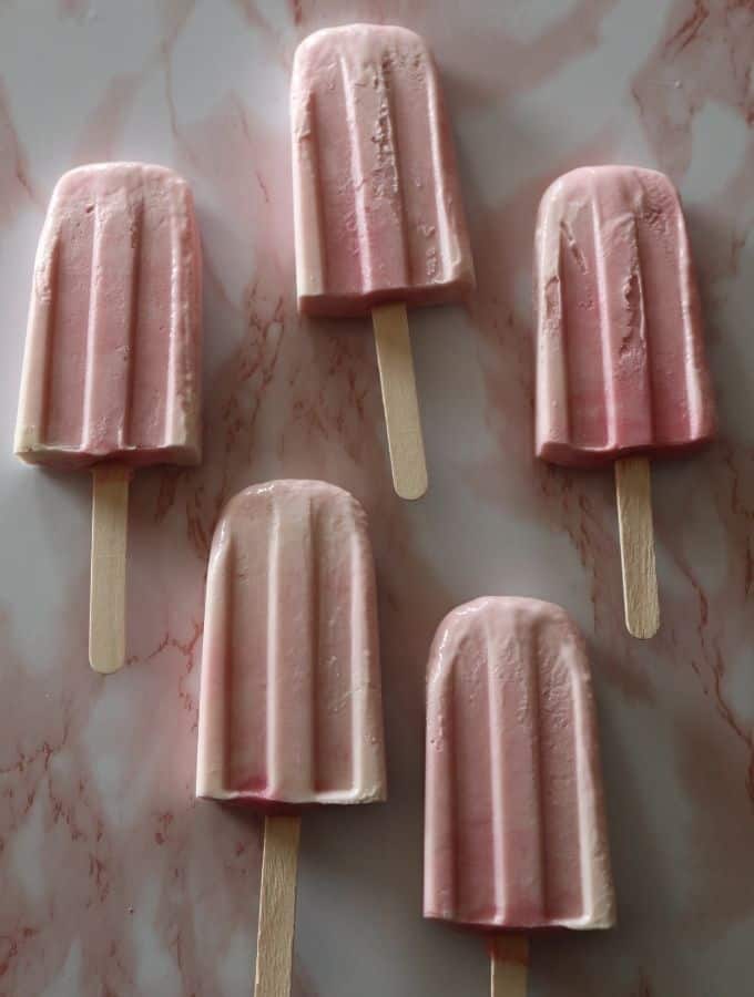 5 raspberry creamsicles out of the mold and ready to eat